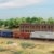 Märklin 81875 Spur Z Startpackung Moderner Güterverkehr – Diesellok BR 285 mit Metallfahrwerk, 3 Güterwagen, Gleisoval & Fahrgerät – Modellbahn Startset 1:220 - 3